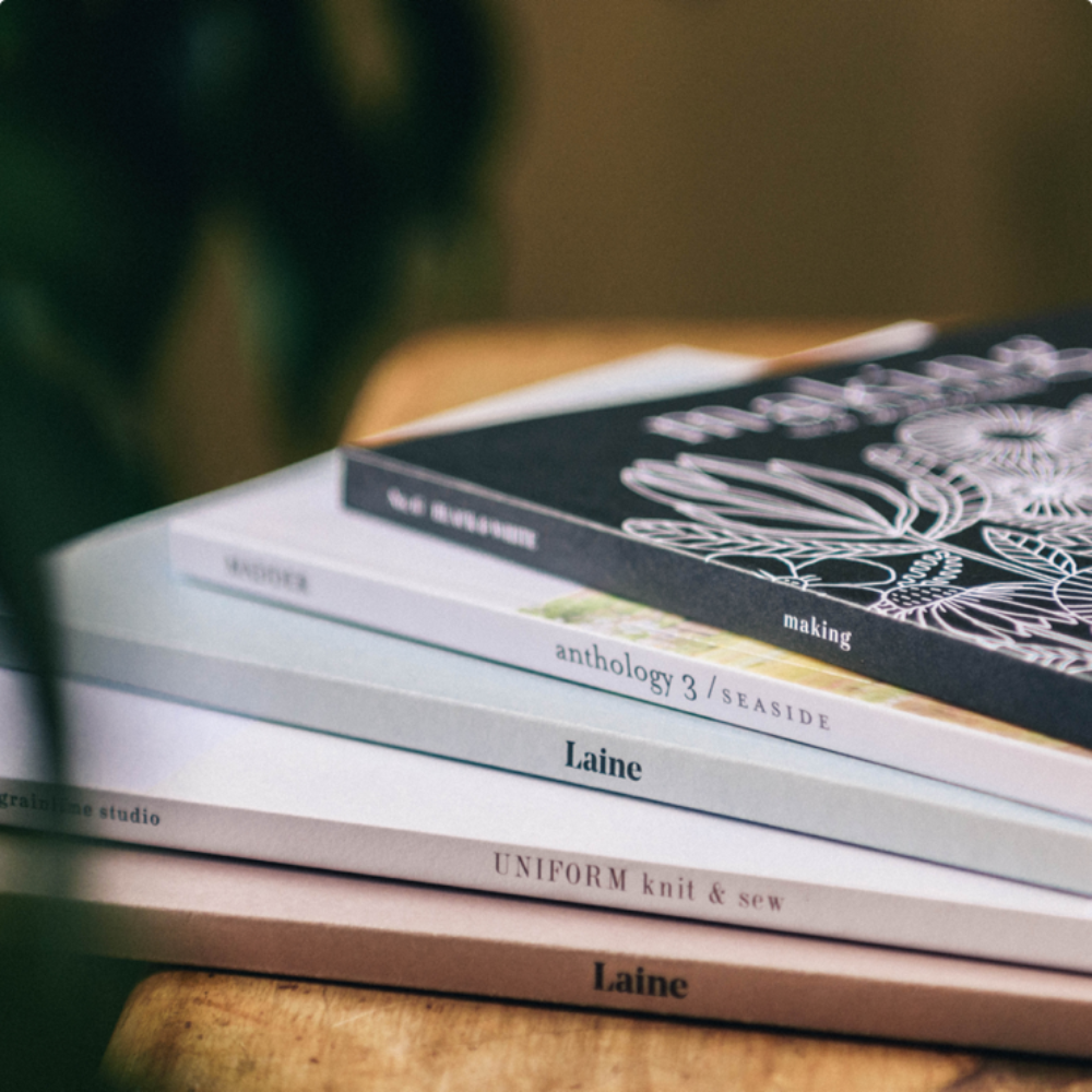 Stack of Laine Books with Knitting Patterns