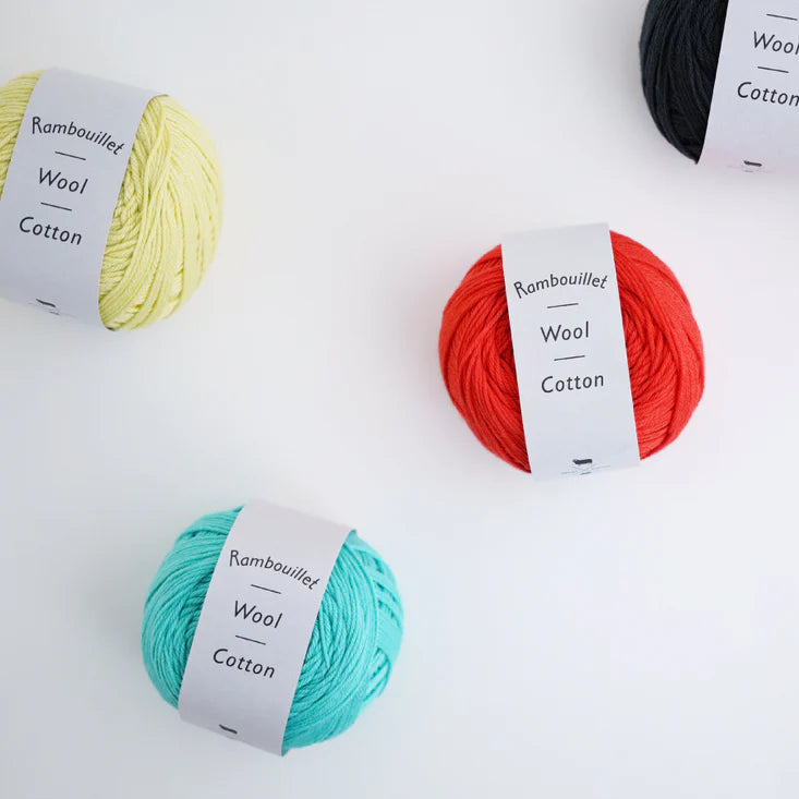 Five balls of luxury yarn blending Rambouillet merino wool with Supima cotton, bringing an exquisite balance of smooth cotton and a light touch of wool.