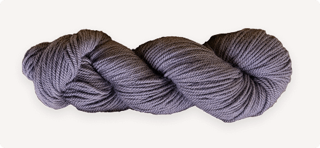 Gray skein of yarn on a white background