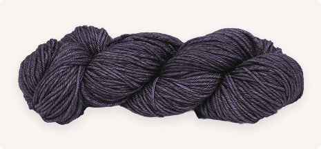 Dark blue skein of yarn on a white background
