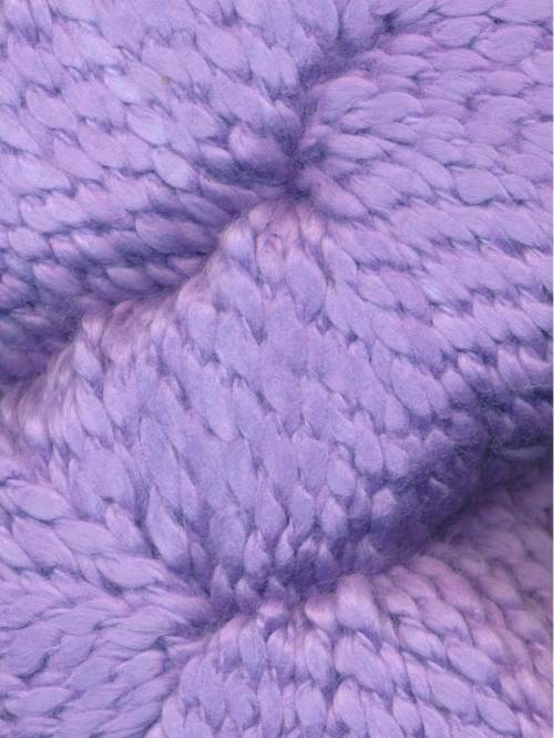 Close-up of chunky-knit Juniper Moon Farm Bud yarn texture in lavender purple, 100% GOTS certified organic Peruvian cotton.